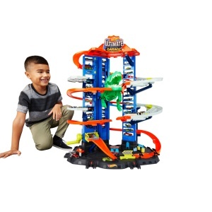 Garaj Hot Wheels cu T-Rex si 2 Masinute, Capacitate 100 Vehicule, Inaltime 90cm