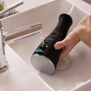 Dus bucal portabil Cecotec Bamba ToothCare 1100, 6 moduri, LED, 280 ml, USB - Img 4