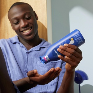 Lotiune pentru corp NIVEA Reichhaltige Body Milk, 400 ml, cu Hyaluron si Ulei de Migdale - Img 5