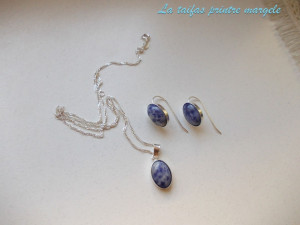 Sterling silver earrings and pendant set with oval sodalite
