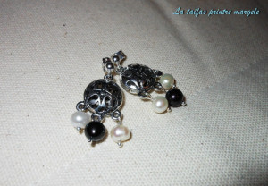 Chandelier earrings with white and black pearls