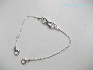 Sterling silver ornamented infinte sign bracelet