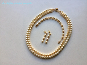 Necklace and earrings set of cream and light gold Swarovski pearls