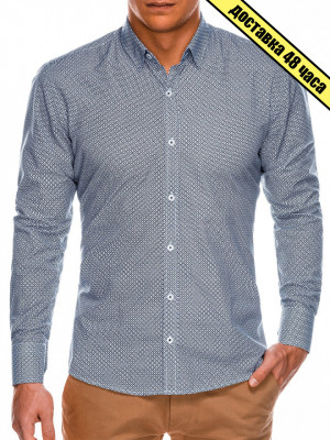 Мъжка риза с кройка Slim fit е модел с дълъг ръкав и класическа яка. Произведена от 58% памук, 42% полиестер