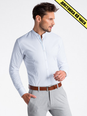 Атрактивен модел Slim fit риза в бял цвят и с попска яка. Идеален за ежедневни и елегантен стил.