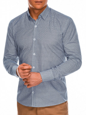 Мъжка риза с кройка Slim fit е модел с дълъг ръкав и класическа яка. Произведена от 58% памук, 42% полиестер