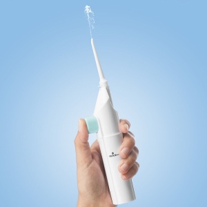 Irigatorul dentar ergonomic pentru curățarea dinților și a gingiilor