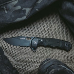 Cutit pliabil SOG SEAL XR Serrated 12-21-05-57, lama Clip Point CPM S35VN Black TiNi Partial Serrated, XR Lock, Flipper, maner GRN Black, Made in USA - Img 10