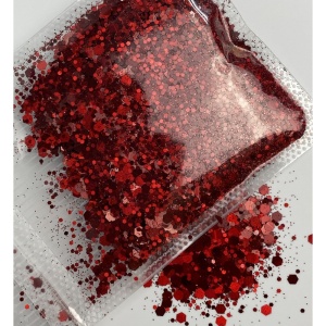 Detaliu particule chunky glitter roșu închis