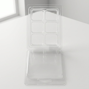 Matriță clam shell cu 6 pătrate, umplută cu wax melts verde mentă, PET transparent