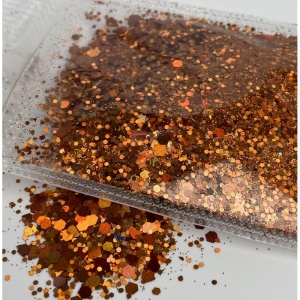 Detaliu particule chunky glitter portocaliu