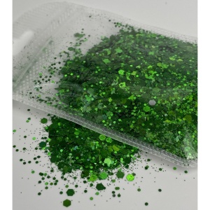 Detaliu particule chunky glitter verde închis