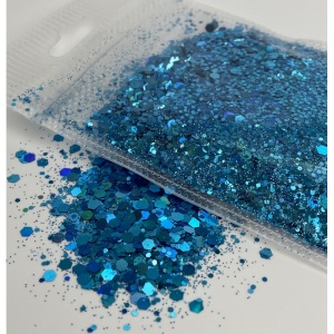 Detaliu particule chunky glitter albastru deschis