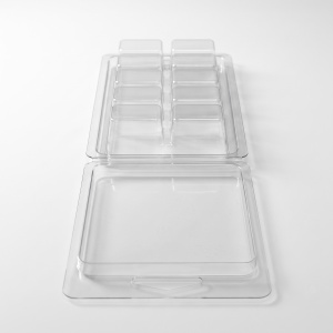 Matriță clam shell snap bar cu 10 cuburi, umplută cu wax melts bleu și alb, PET transparent