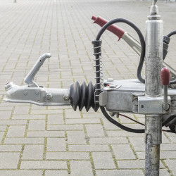 Spring bracket for electric connection cable for caravan car electric connection