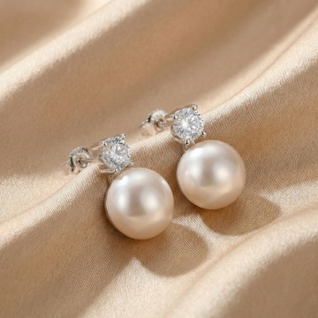 Cercei din argint 925 cu moissanit 0.5CT si perla de cultura
