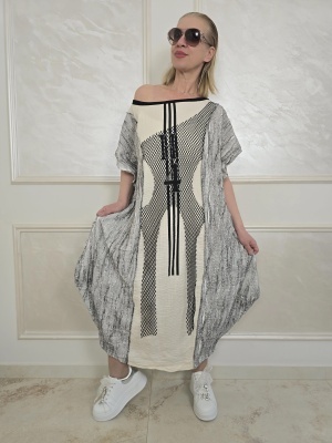 Дамска миди рокля в бежово с разчупен дизайн