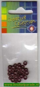 Eyelets bordeaux 25 stuks nr.20407/18 (Locatie: 5RC1 )