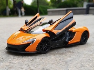 MASINUTA METALICA McLAREN P1 PORTOCALIU SCARA 1 LA 24 - Img 5