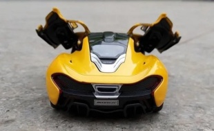 MASINUTA METALICA McLAREN P1 PORTOCALIU SCARA 1 LA 24 - Img 6