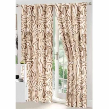 draperie de culoare bej / crem aranjata la fereastra