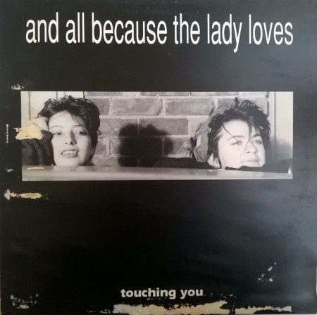 And All Because The Lady Loves... ‎– сингъл Touching You