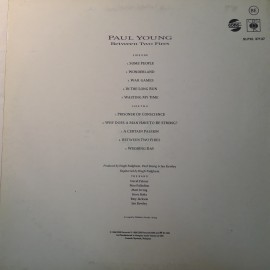 Paul Young ‎– албум Between Two Fires - Img 2