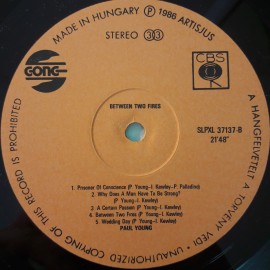 Paul Young ‎– албум Between Two Fires - Img 4