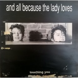 And All Because The Lady Loves... ‎– сингъл Touching You