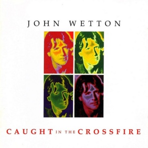 WETTON, JOHN - CAUGHT IN THE CROSSFIRE