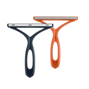 Set de 2 perii pentru scame Tarumedo, metal/plastic, portocaliu/albastru inchis, 13 x 14 cm