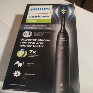 Periuta de dinti electrica Philips Sonicare HX7101/01, 62.000 miscari/minut, autonomie 21 zile, 1 mod periere, 2 intensitati, senzor presiune integrat, functia BrushSync, inclus capat de periere Otimal White, negru, Resigilat, Grad A - Img 2
