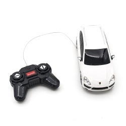 MASINA CU TELECOMANDA PORSCHE CAYENNE TURBO ALB CU SCARA 1 LA 24 - Img 2