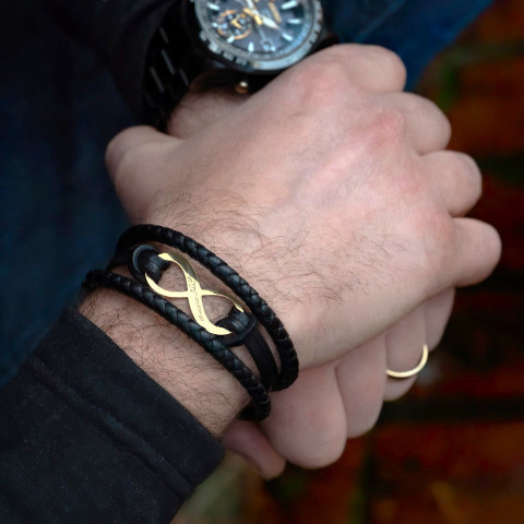Personalisiertes Lederarmband mit goldenem Unendlichkeitssymbol - Elegantes und einzigartiges Accessoire - Img 1