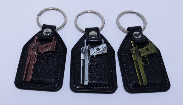 Fita porta chaves com pistola