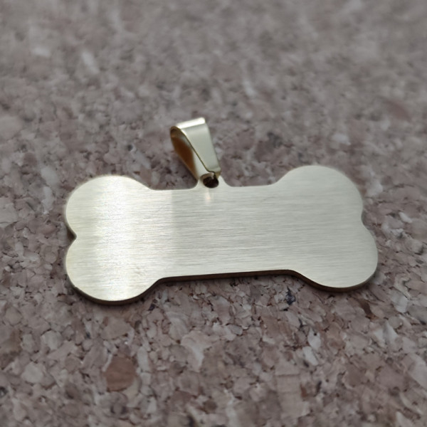 Medalha dourada Osso - 35x18mm
