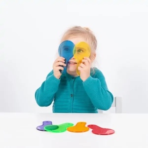 Set TickiT cu șase palete circulare transparente colorate în culori primare și secundare, concepute pentru explorarea luminii și amestecarea culorilor.