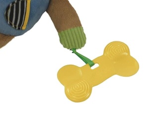 Cățeluș de pluș moale și colorat, ambalat într-o cutie decorativă ilustrată, prevăzut cu accesoriu pentru dentiție și elemente multisenzoriale pentru bebeluși.
