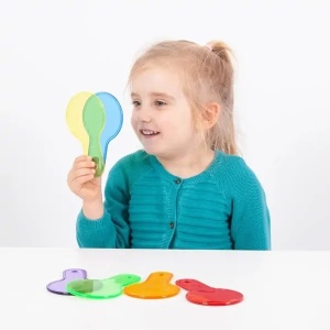 Set TickiT cu șase palete circulare transparente colorate în culori primare și secundare, concepute pentru explorarea luminii și amestecarea culorilor.