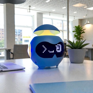 Ceas digital interactiv cu animații faciale, alarmă, Bluetooth și boxă integrată, design modern pentru birou sau casă