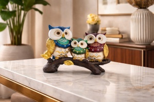Figurina decorativa bufnite pe ramura simbol intelepciune