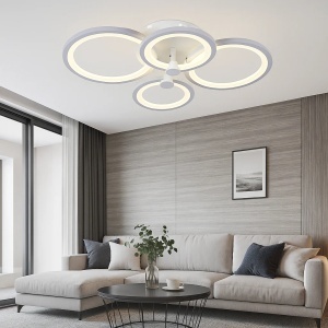 Lustră LED modernă cu cercuri suprapuse și lumină caldă, având un design fluid și elegant