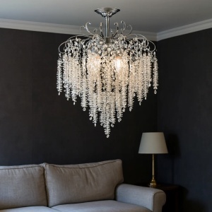 Candelabru elegant cu cristale în cascadă și finisaj cromat, perfect pentru interioare rafinate