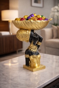 Statuetă africană decorativă cu suport în formă de frunză, simbol al eleganței, culturii africane și armoniei naturale