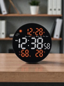 Ceas digital rotund cu afișaj LED, temperatură, umiditate, dată și prognoză meteo, design modern pentru interior.