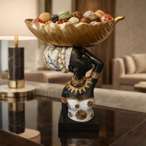 Statuetă africană decorativă cu suport în formă de frunză, simbol al eleganței, culturii africane și armoniei naturale