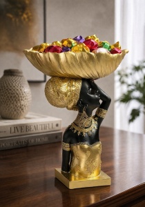 Statuetă africană decorativă cu suport în formă de frunză, simbol al eleganței, culturii africane și armoniei naturale