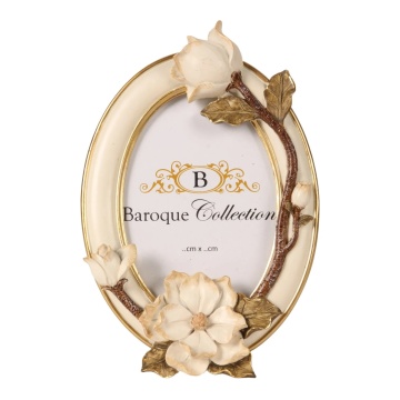 Ramă foto din polirășină, crem și auriu, ovală, cu ramură cu flori de magnolie sculptate, 22 x 14,8 x 3,5 cm, „Brocart”
