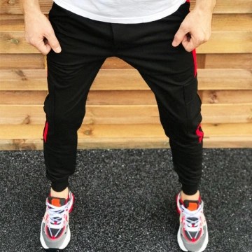 Pantaloni barbati casual negri, conici, cu dungi laterale rosii - Img 3