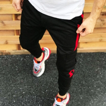 Pantaloni barbati casual negri, conici, cu dungi laterale rosii - Img 1